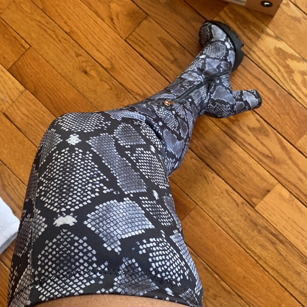 Thigh high snakeskin boots